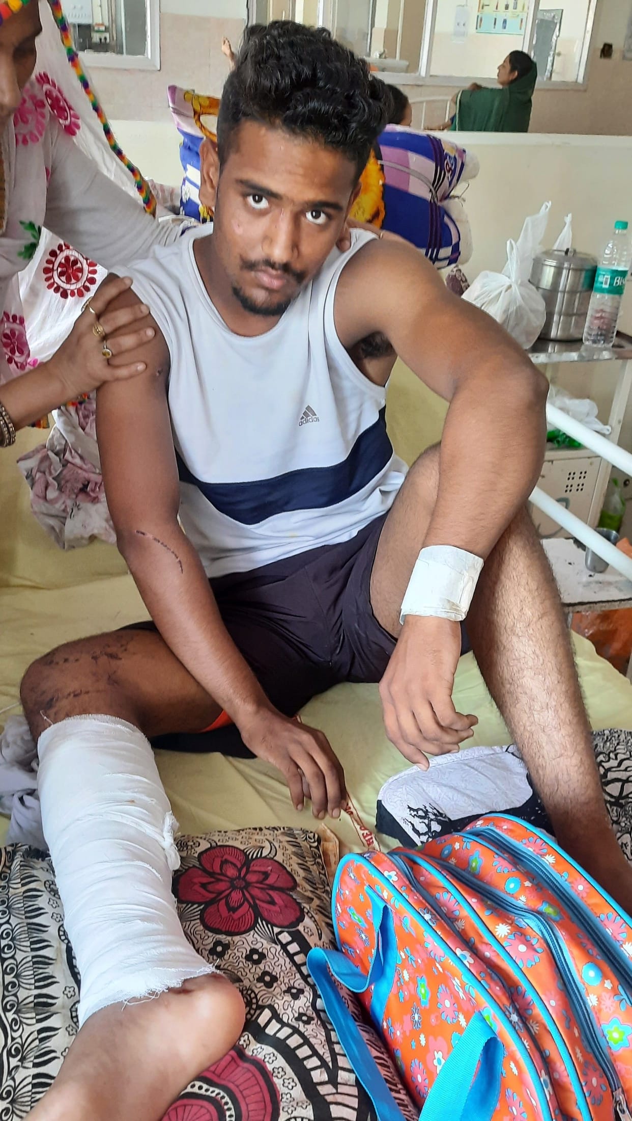 Car climbs on national player's feet, cash snatched from father