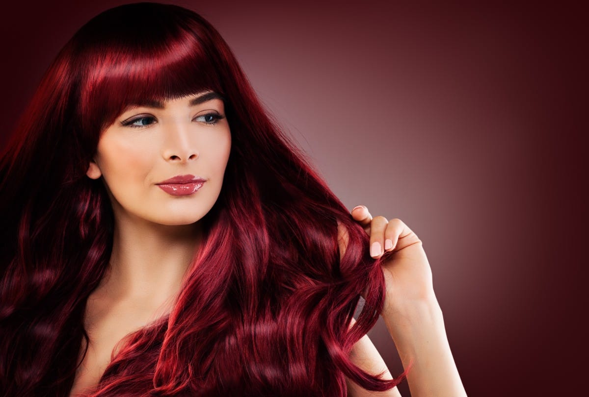 know how to massage hot oil in hair