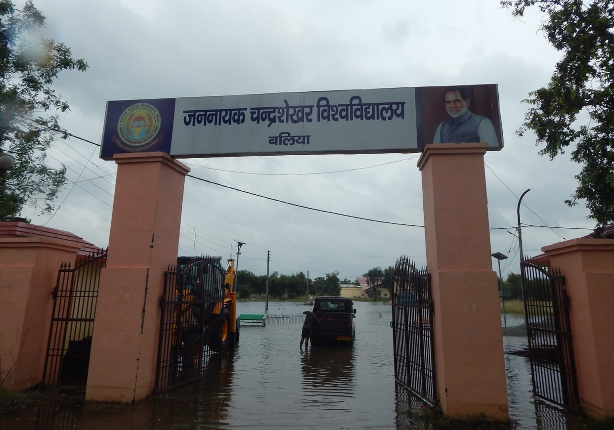 Water logging in the university campus, crossing the boat with the help of boat
