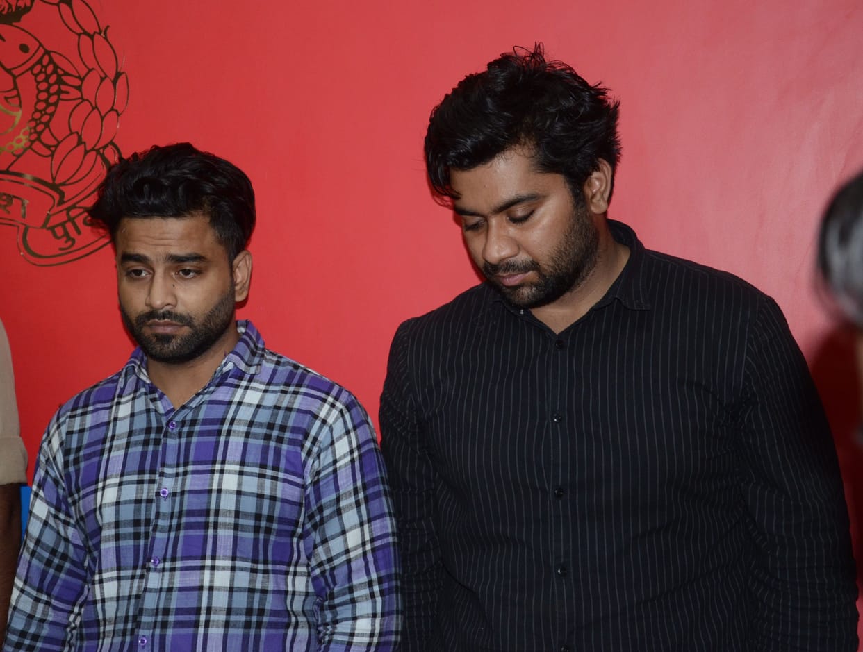 Two arrested for stealing from a car by scooty