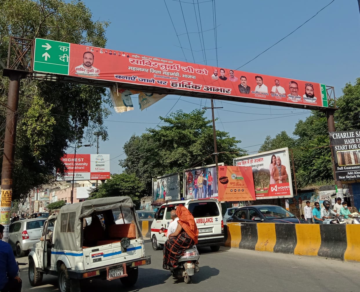 Sign boards covered with banners, people are finding it difficult to find a way