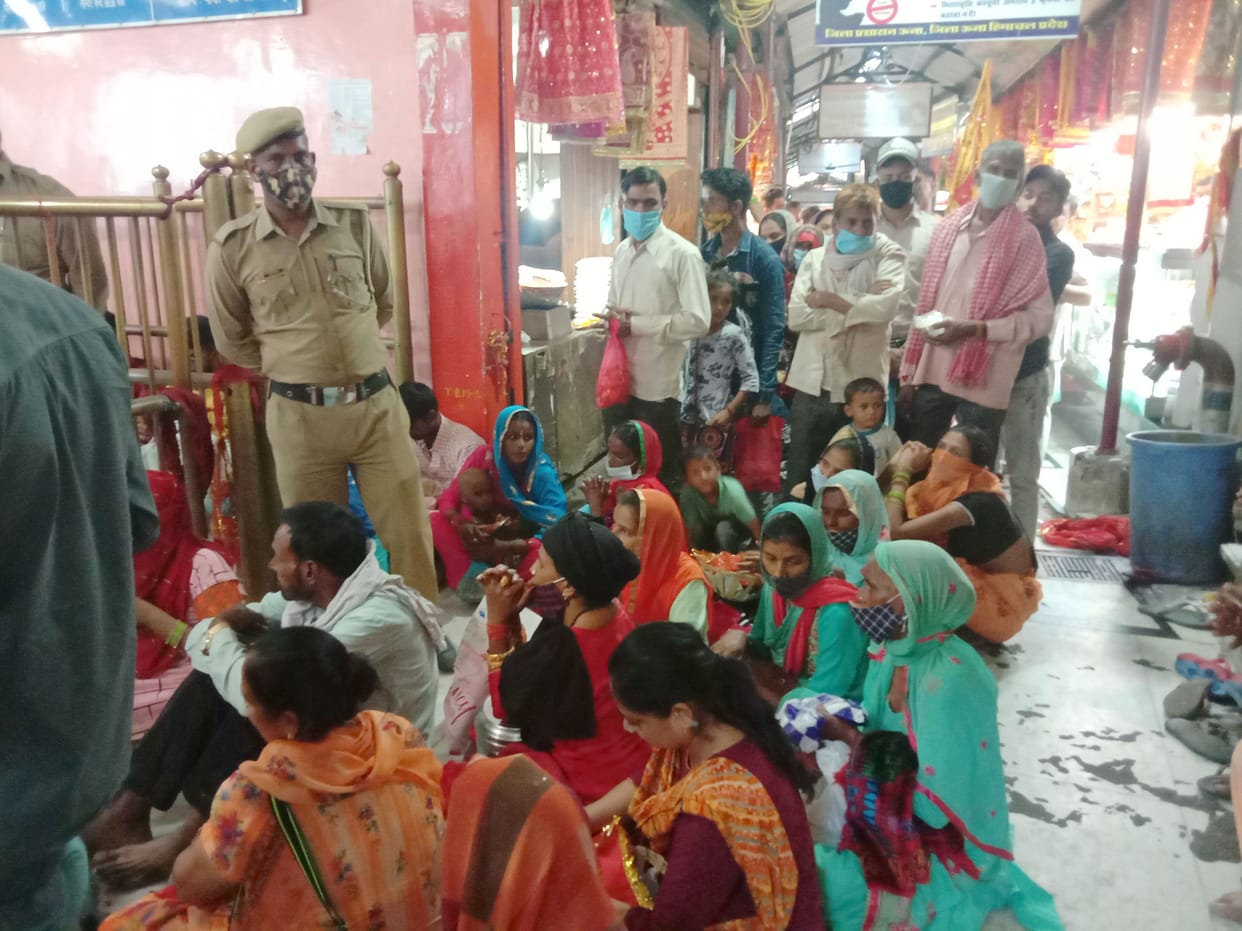 The queue of devotees from the old bus stand to the temple