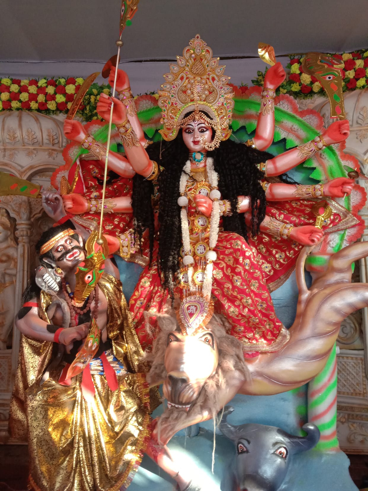 As soon as the doors opened, the crowd gathered in the pandals to see the mother.