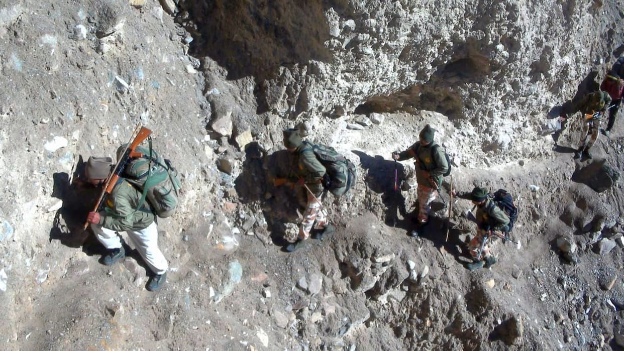 To protect the China border, soldiers are reaching forward posts by crossing inaccessible paths on foot