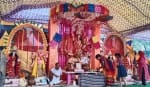 Mother adorned in the form of Kalratri, devotees gathered for darshan