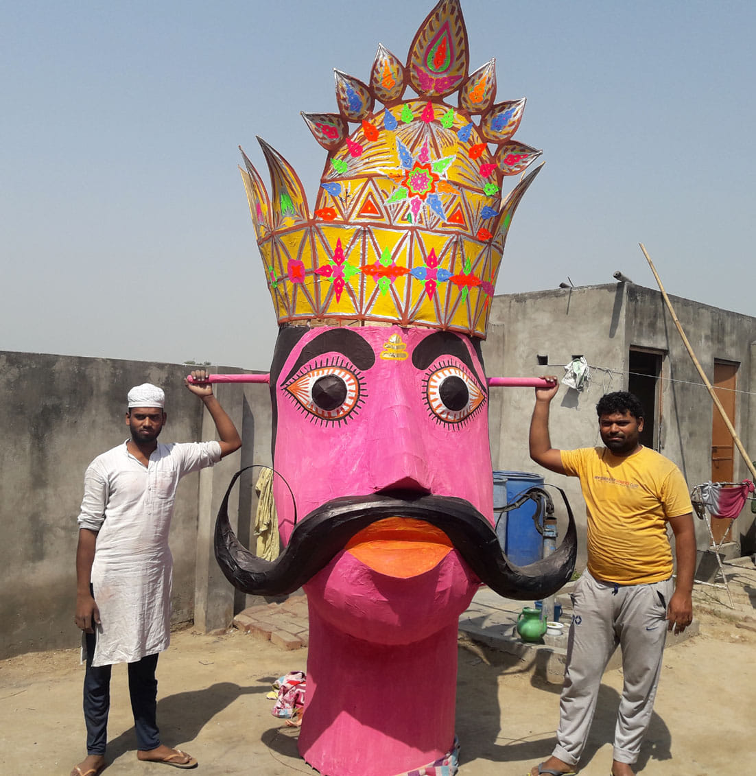 Muslim artisans are preparing the effigy of Ravana