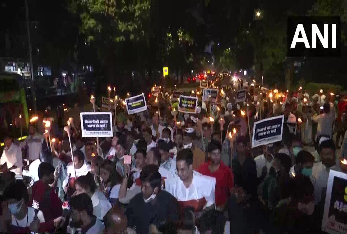 Indian Youth Congress workers hold torchlight march over Lakhimpur Kheri violence