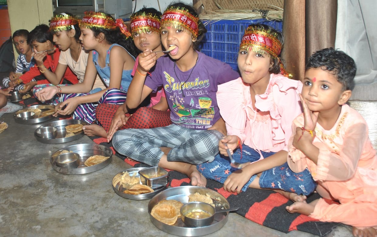 Offered food to the mother, worshiped the girls