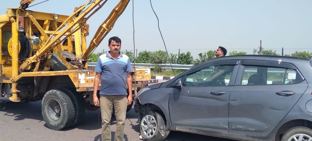 Car overturns, four injured including doctor