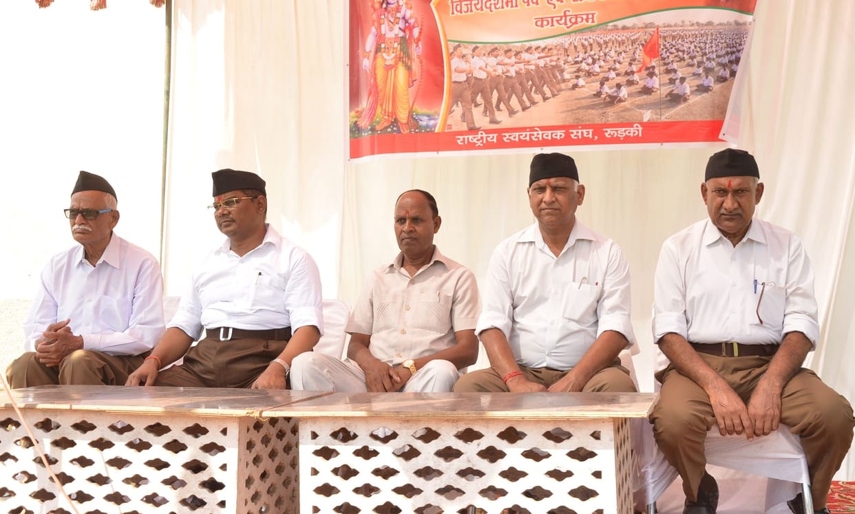 Volunteers performed arms worship by hoisting the flag
