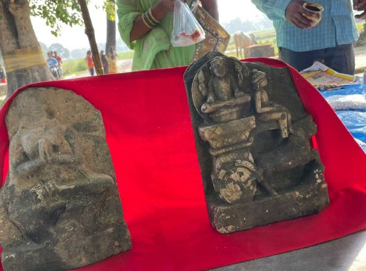 Two ancient statues found after removing the debris of the temple wall
