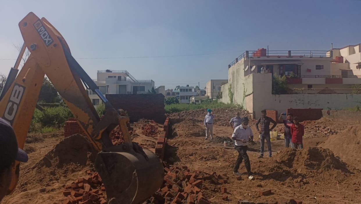 Council demolished illegal constructions from JCB in Sukhna Enclave