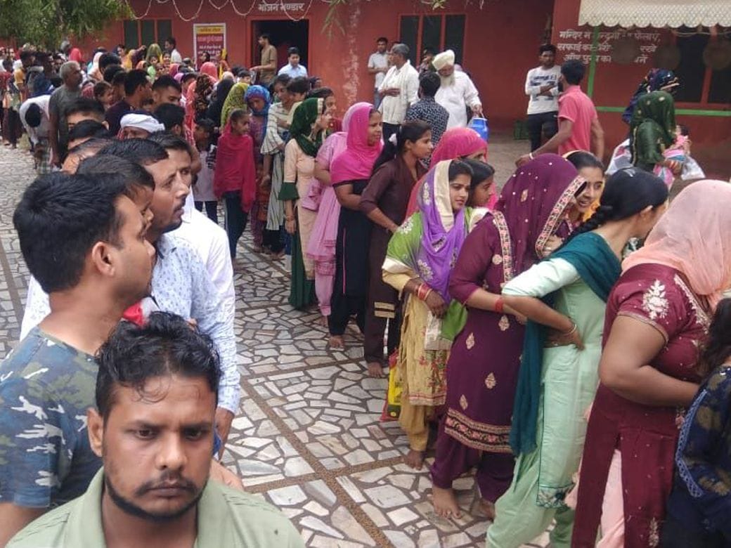 Devotees offer prayers by offering flowers