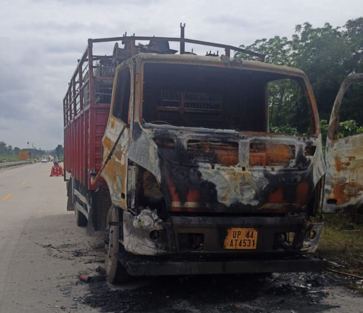 Mini truck burnt on the highway