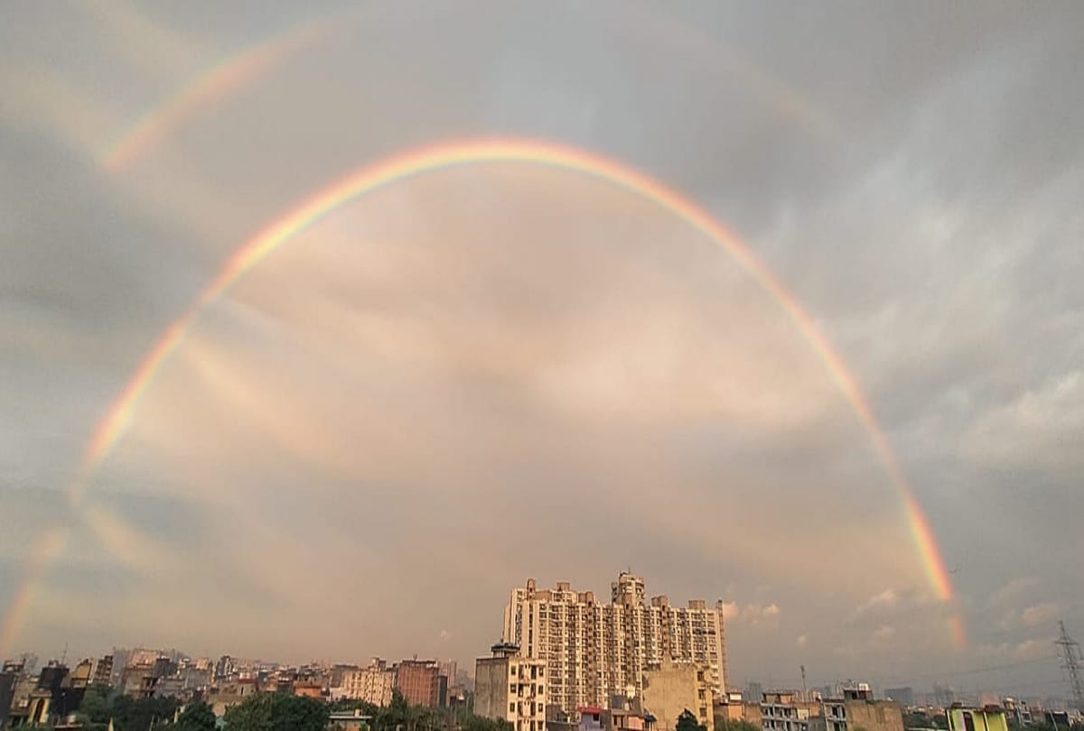 delhi ncr weather updates rainbow with beautiful sky seen in many places people took pictures