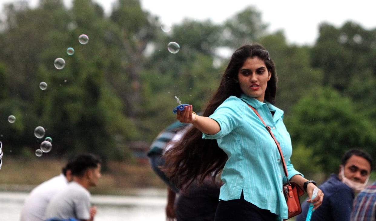 Tourists have fun at Sukhna Lake amidst rain showers