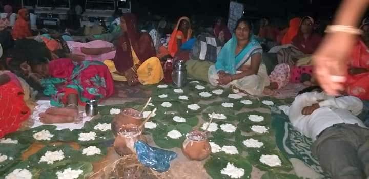 Devotees take a bath in Mandakini and circumambulate