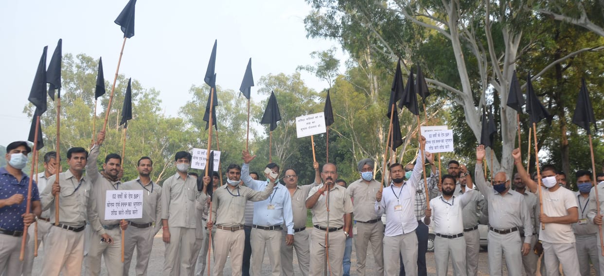 BHEL workers protest with black flag