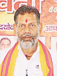 minister booked with his son in dispute