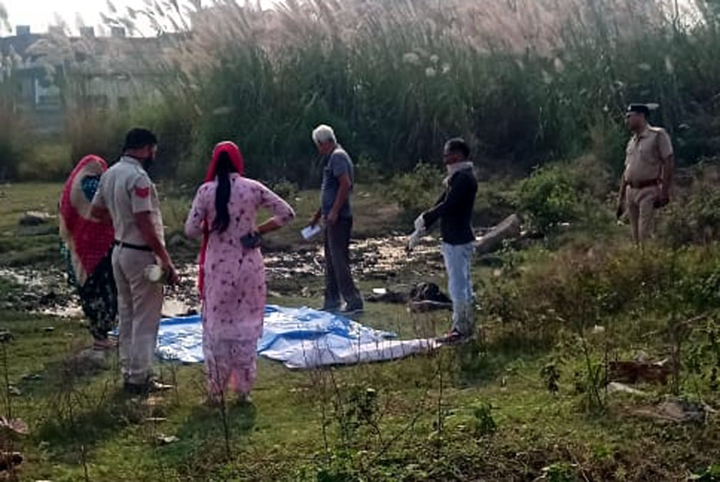 beheaded body found in johad