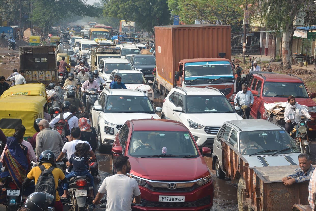 Vehicles stuck in pit near PAC, Road jam