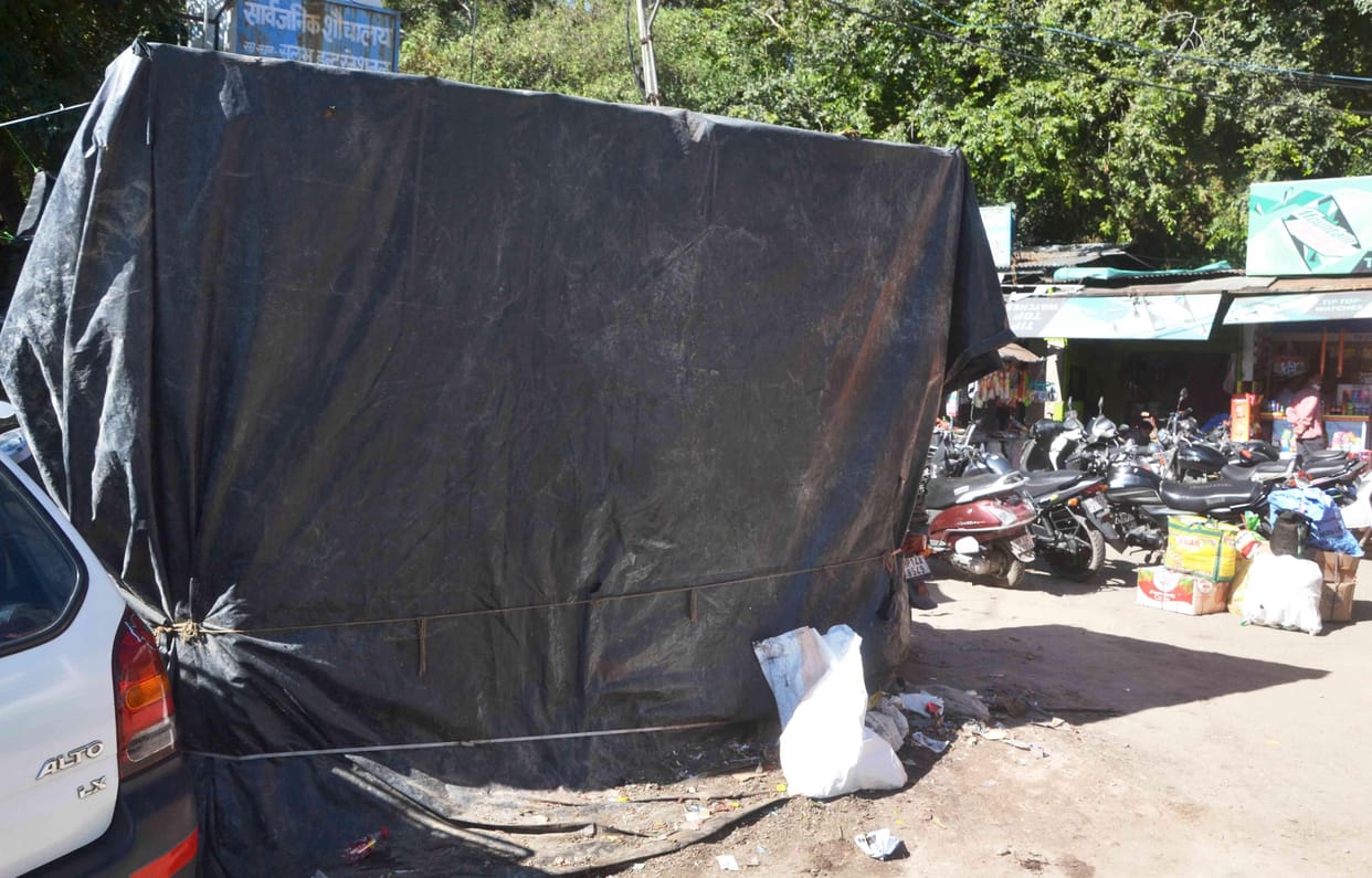 Garbage cabins covered with sheet in Solan bus stand