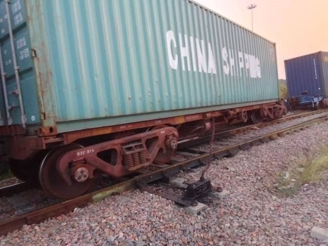Two wagons of goods train derailed while loading container