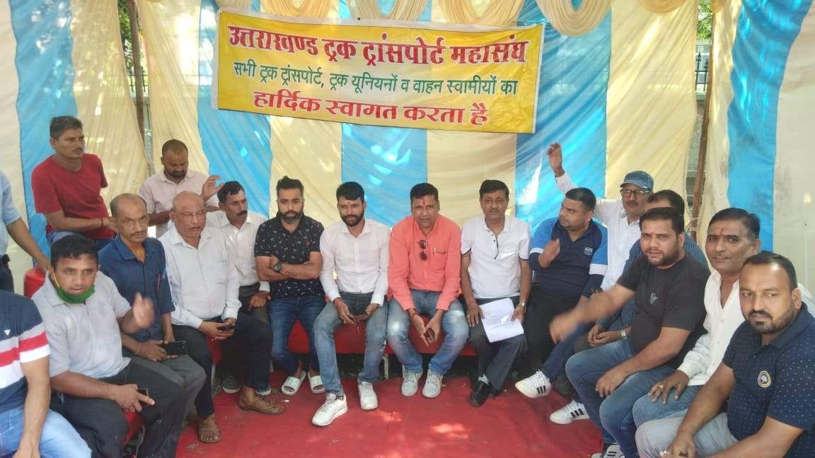 Against Rail Vikas NigamTruck operators sitting on dharna