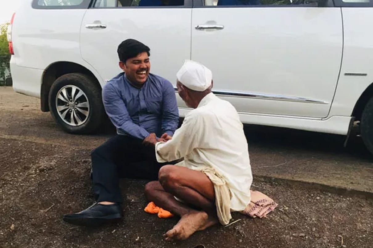 Ias Ramesh gholap tweet his picture sitting with Senior citizen in social media