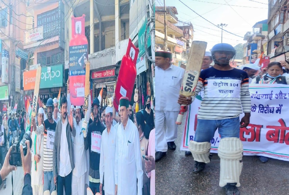 Congress  protesed by waving bat on the century of petrol in mandi himachal