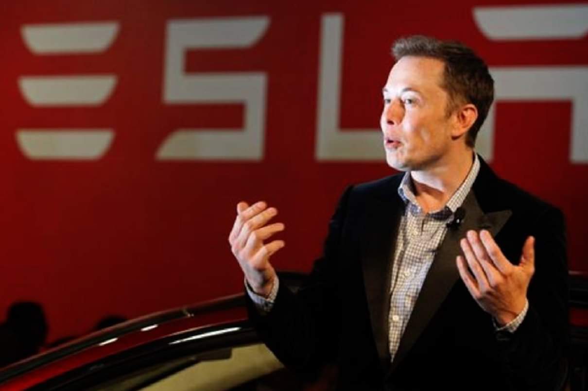 Tesla Chief Elon Musk slams US President Joe Biden Elon Musk says Biden is a damp Socks puppet in human form
