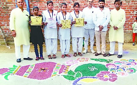 Daughters showed talent by decorating Rangoli