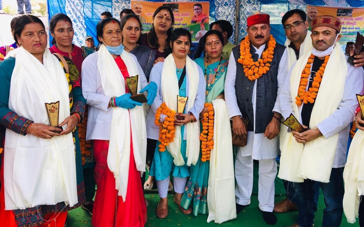 Heads, ASHA and Anganwadi workers honored
