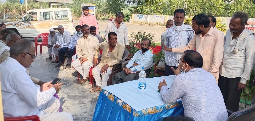 The officials listened to the problems of the farmers