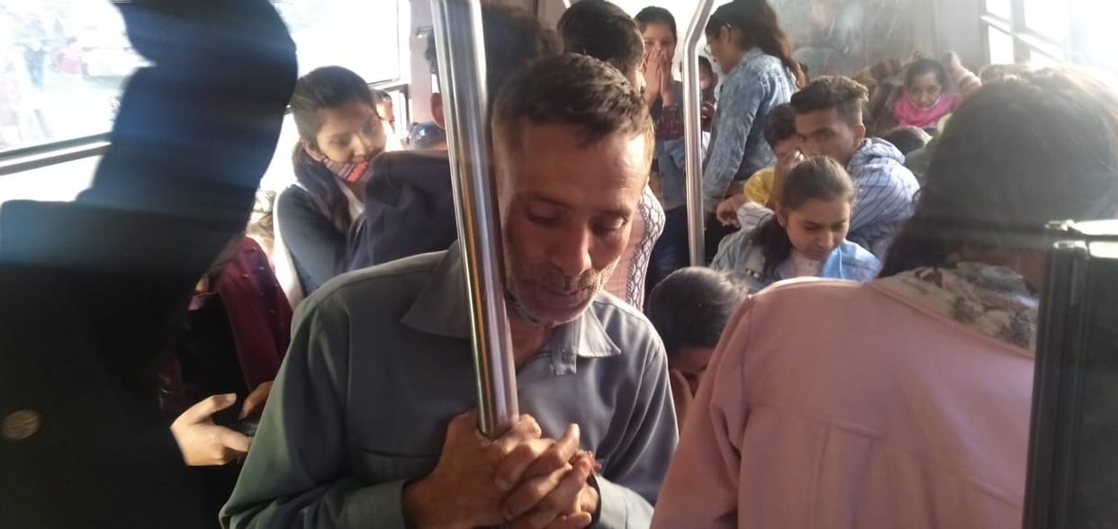 70 passengers being seated in 28 seater bus