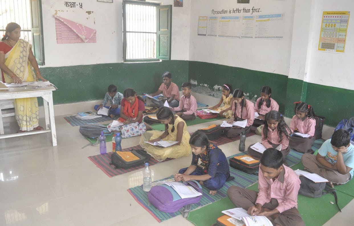 Learning English sitting on sackcloth