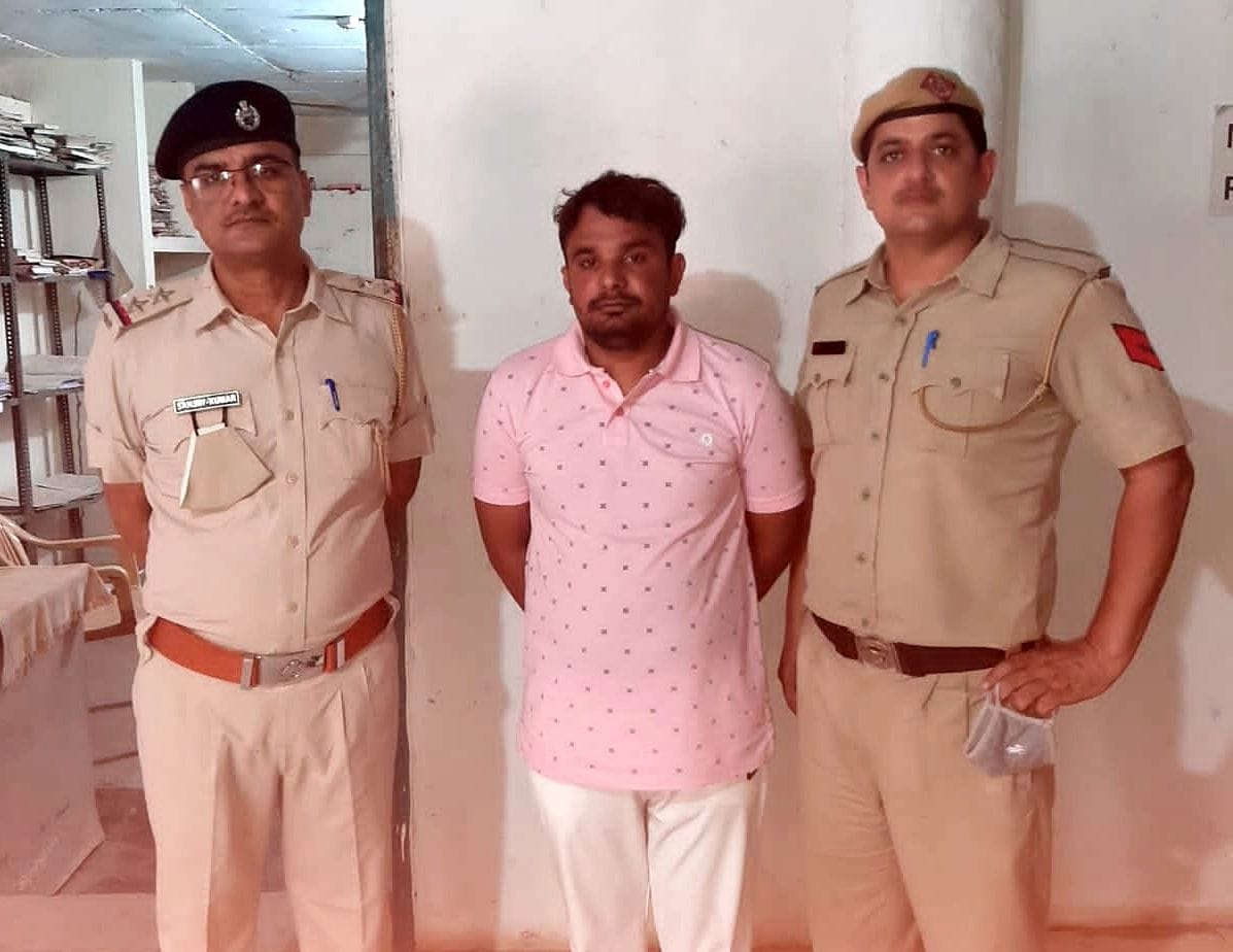 The accused arrested for supplying poisonous liquor hiding in the farmers' movement