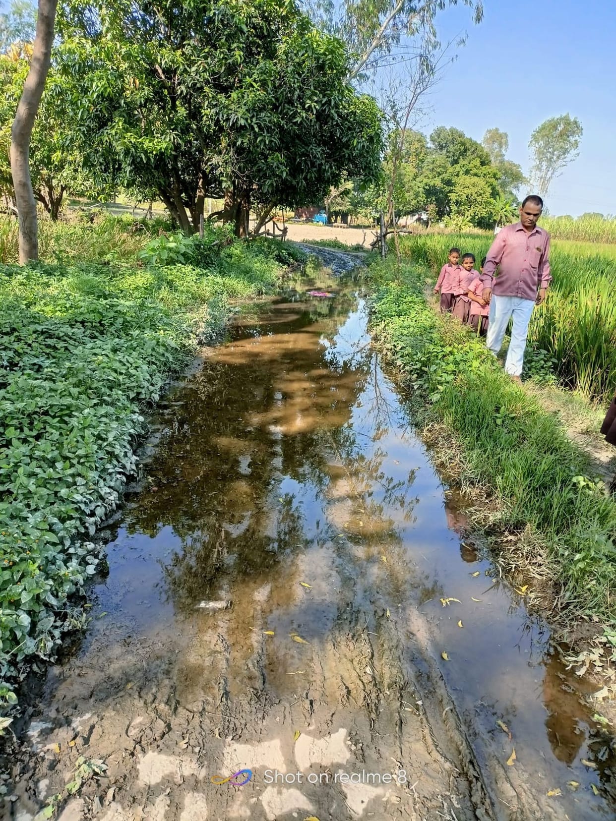 Water filled on the road, trouble for teachers and students