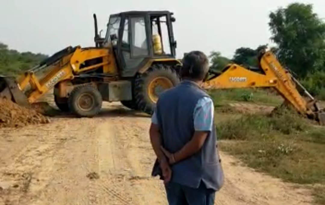 Municipality's JCB doing private excavation