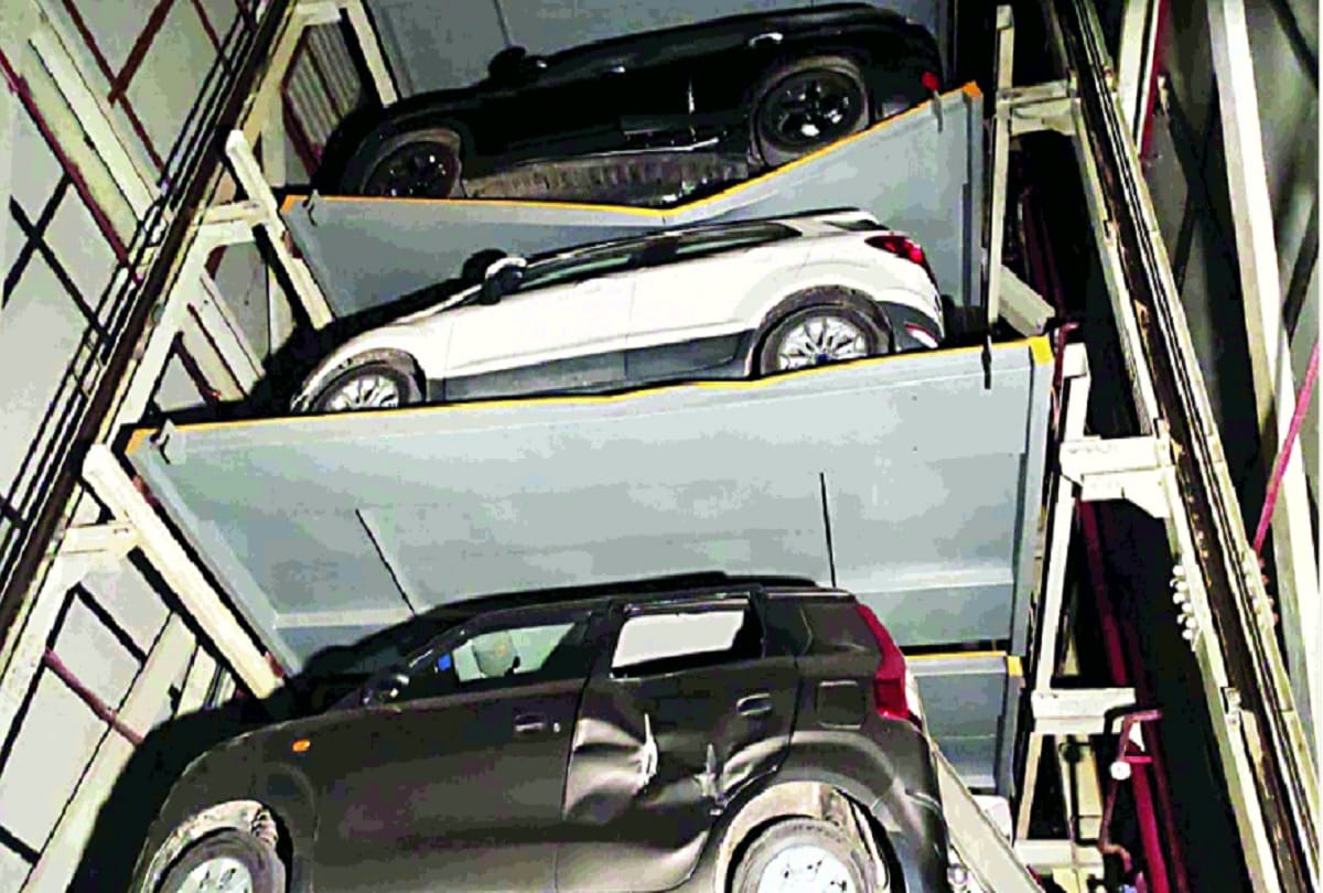 electrical panel of newly built automatic car parking broken in green park many vehicles damaged