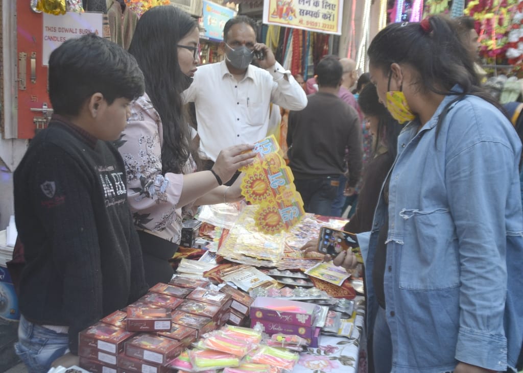 people purchages clothssweet-crackers and others things in nahan city and  others  area of district sirmaur