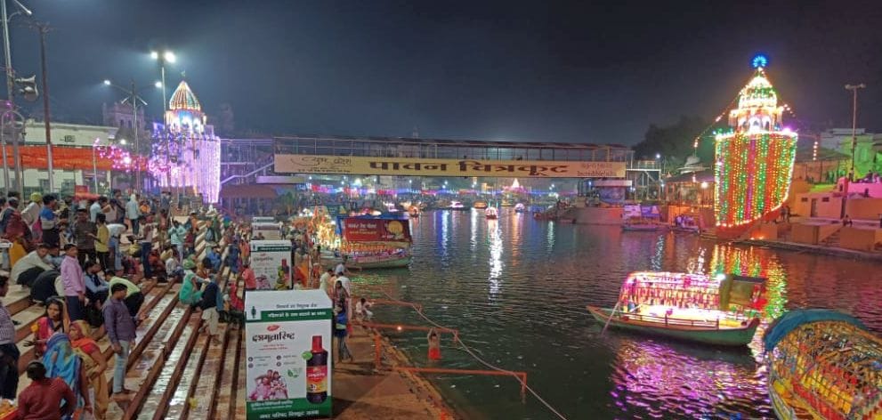 Dharmanagari lit up, the Mandakini coast decorated with lamps