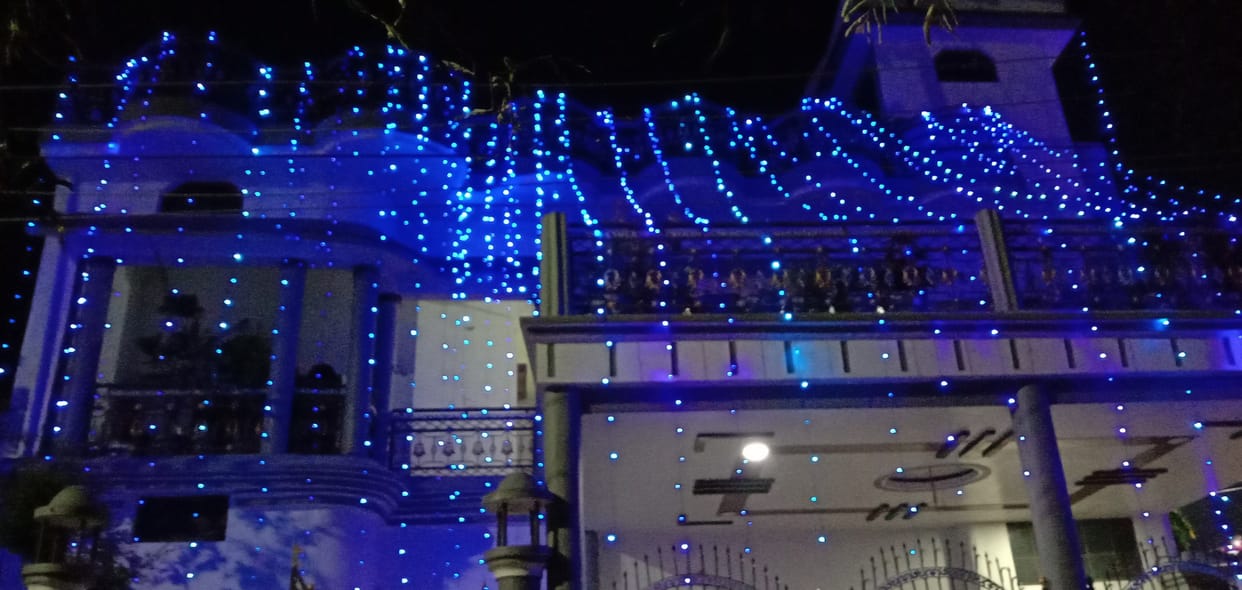 From house to house lit lamps, fireworks, light from the ground to the sky
