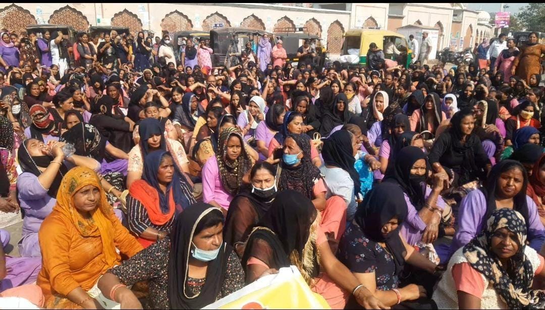 Anganwadi workers wearing black clothes, chunari speak