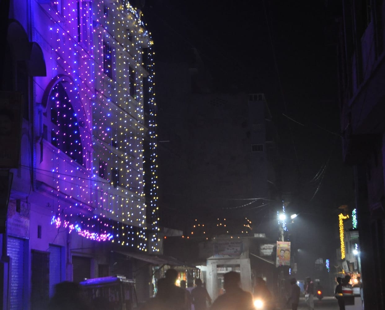 city lit up with light