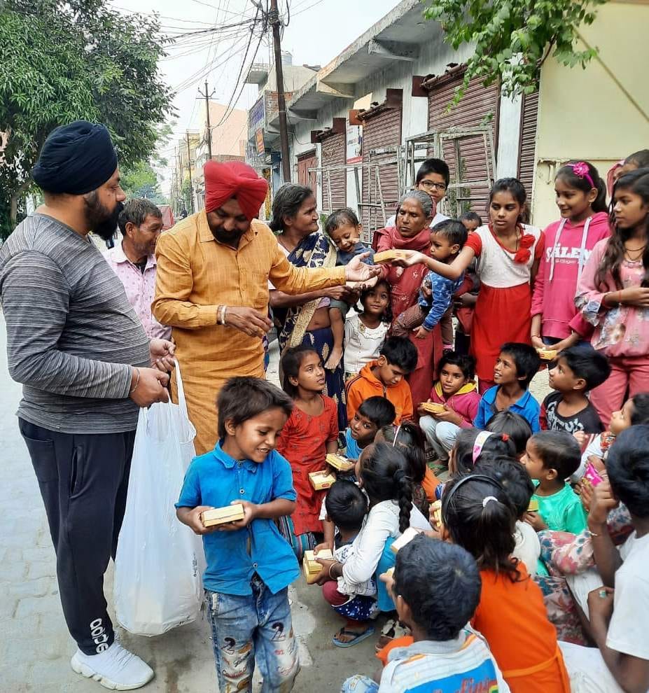 Social workers who joined in the joy of Diwali bloomed on the faces of the poor