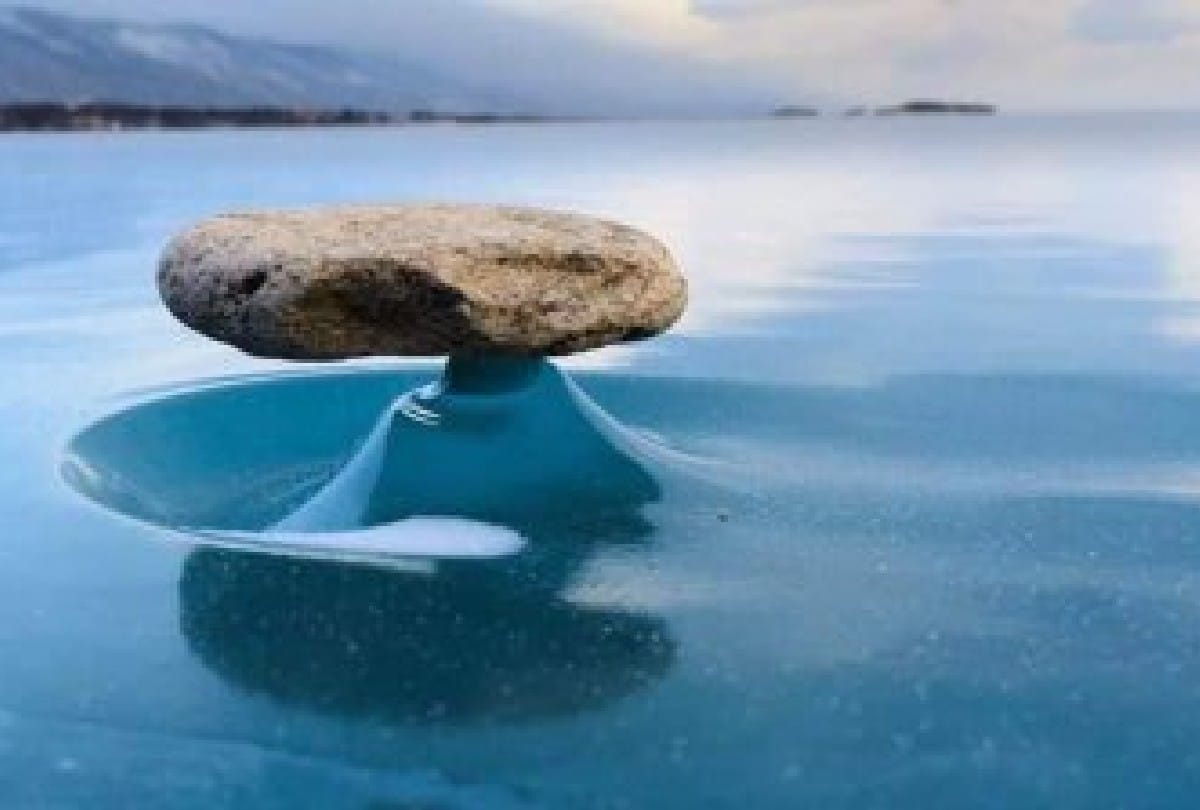 stones hanging in the air on baikal lake Know what is mystery behind it