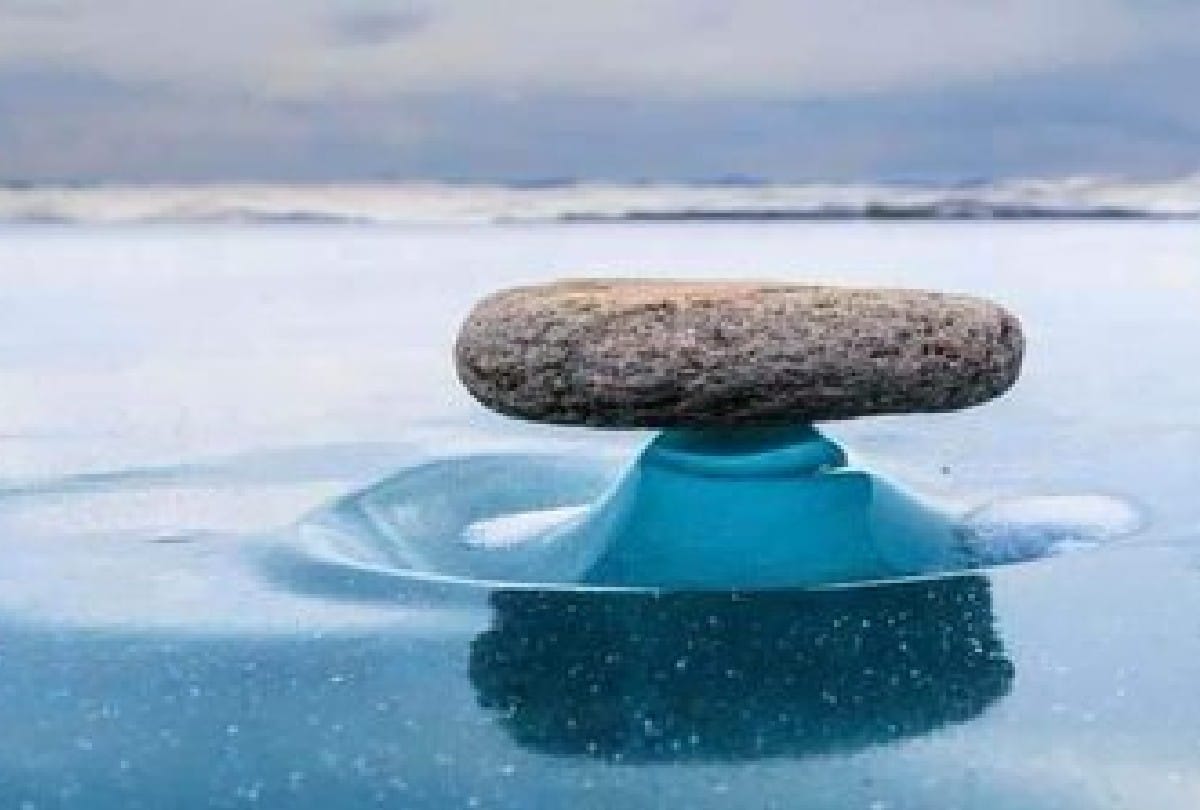 stones hanging in the air on baikal lake Know what is mystery behind it