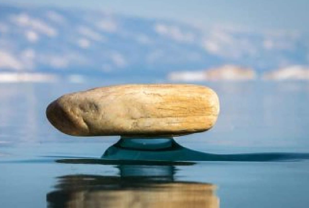 stones hanging in the air on baikal lake Know what is mystery behind it