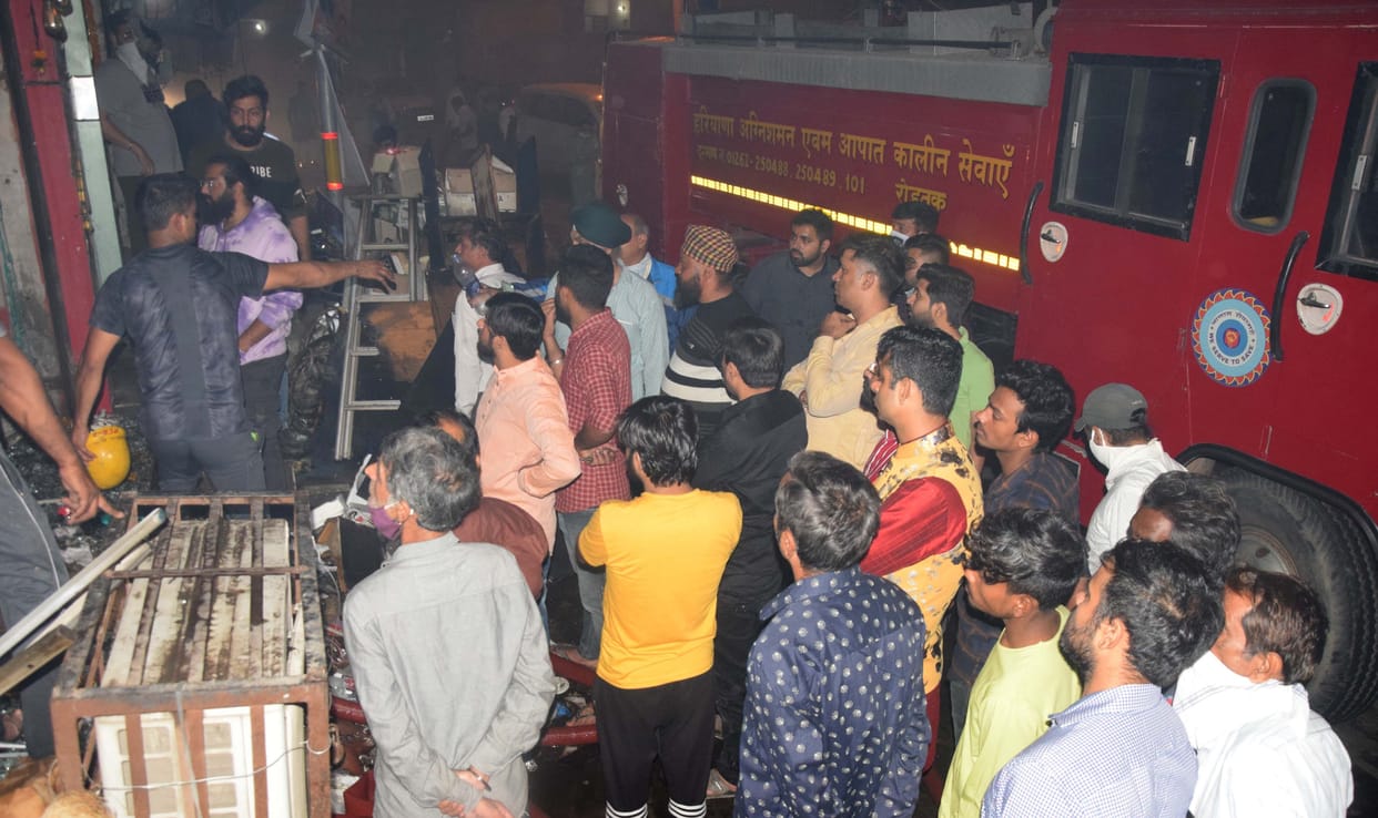 Fire in shop due to short circuit on circular road